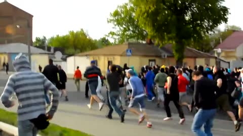 A roving band of armed right sector Nazis attacking people in Kharkov 2014