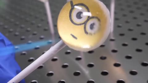 Make smiley face lollipops