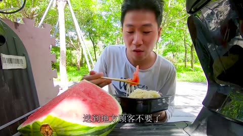 Iced watermelon and cold noodles in summer, a bowl of oily noodles, oily, spicy and delicious