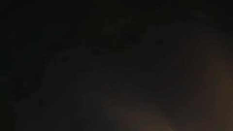 Two unknown drones interacting. Allegedly it was spraying something in the air.