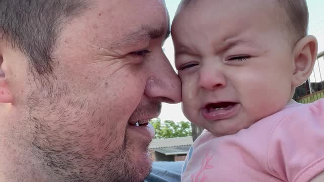 Baby Gets Emotional When Father Sings