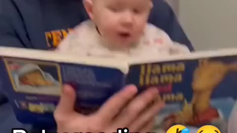 Baby reading a book 🥹😂😂😂👍