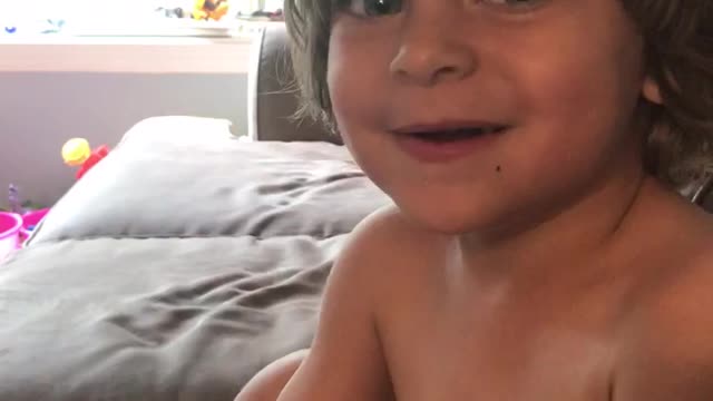 Cute kid tells knock knock joke