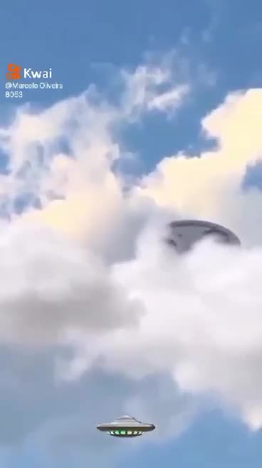I HAVE NEVER SEEN A UFO AS BEAUTIFUL AS THIS COMING OUT OF THE CLOUDS