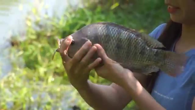 Girl fishing in river