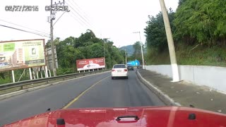 Swerving Truck Nearly Misses Approaching Car