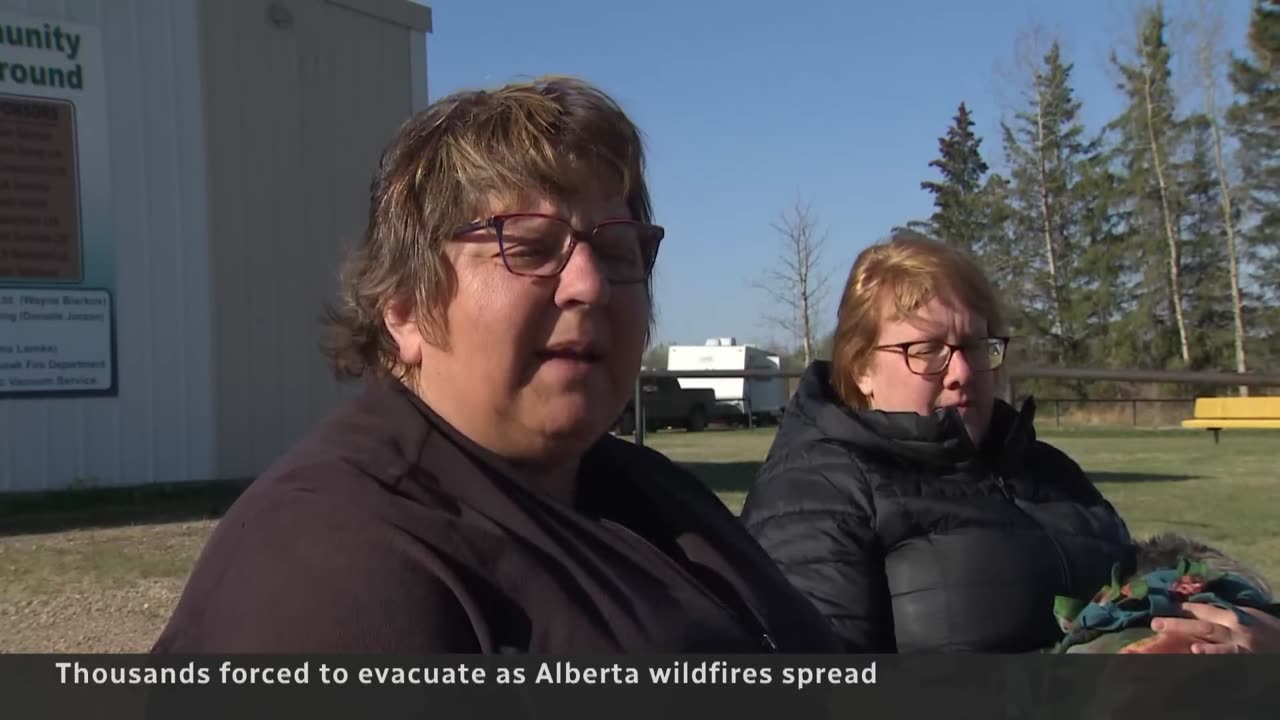 Dozens of wildfires rage in Alberta and Saskatchewan