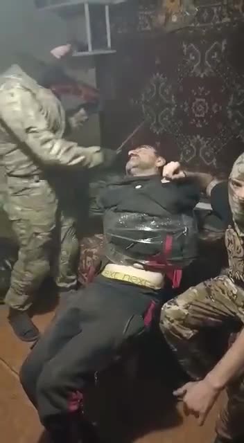 Georgian mercenary caught near Bakhmut is listening to a Wagner concert.