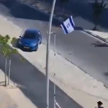 Anti-Israeli Jews take down the flags of the Zionist state from the streets in Beit Shemesh.