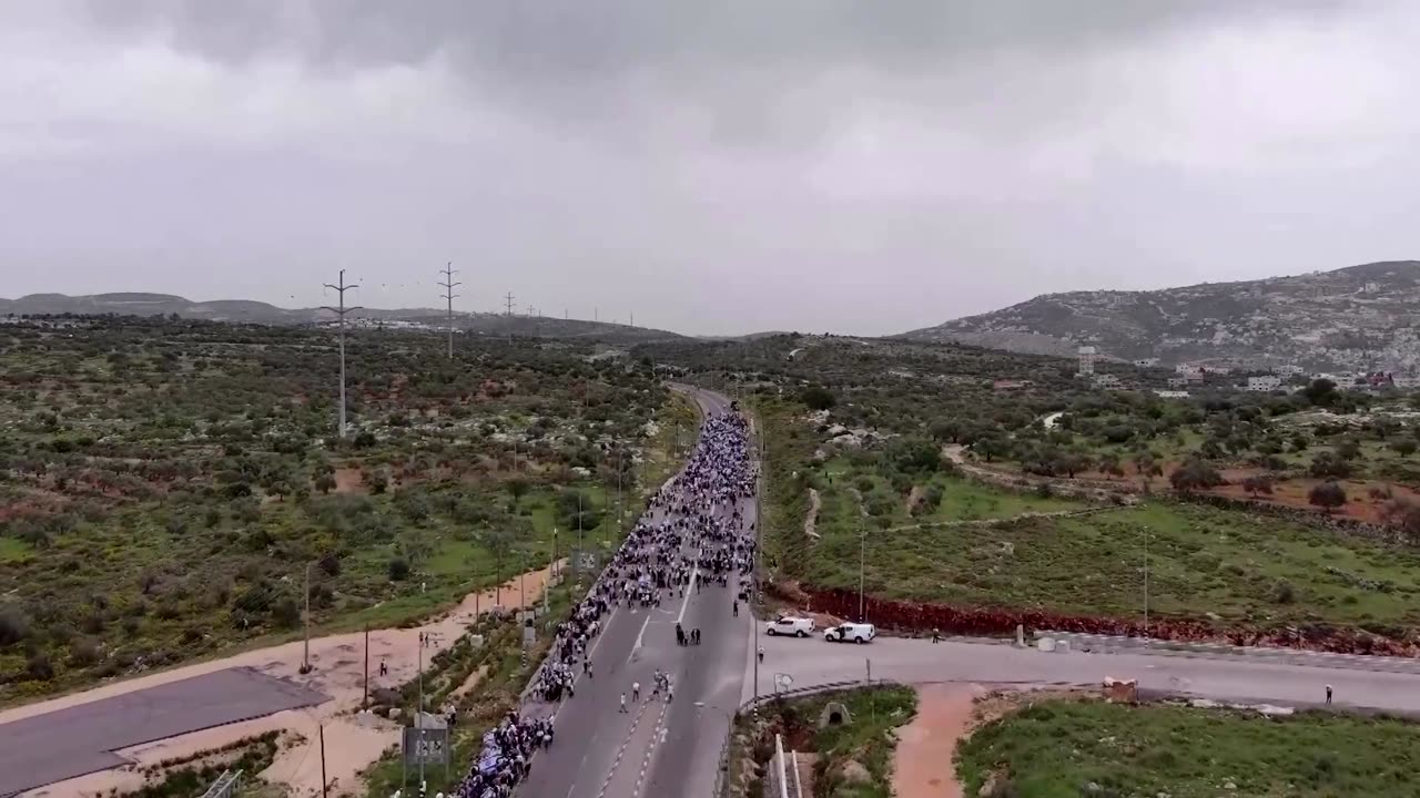 Israeli ministers join protesters in West Bank march