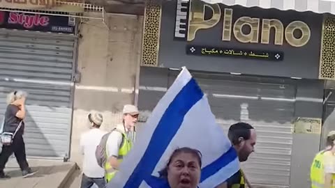 ISRAELI WOMAN SWEARS AT PALESTINIANS DURING SO-CALLED ISRAELI Â FLAG MARCHÂ