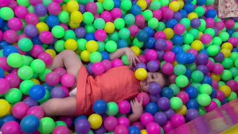 Baby having Fun at playland