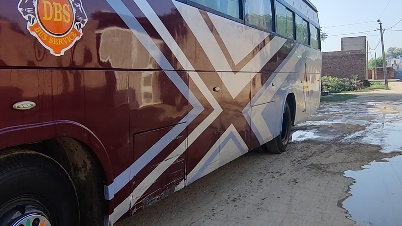 Dashmesh bus service by RJ13 on road