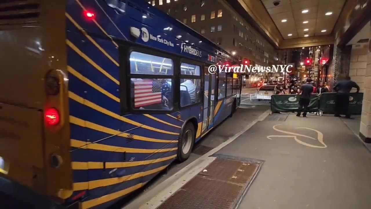 The Roosevelt Hotel NYC: 100s of migrants in & out, busses, cars dropping off aliens.