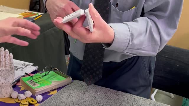 Magician Mark Lewis Performs an Impressive Card Trick