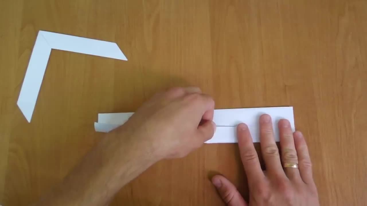 How to make a boomerang out of paper. Origami boomerang