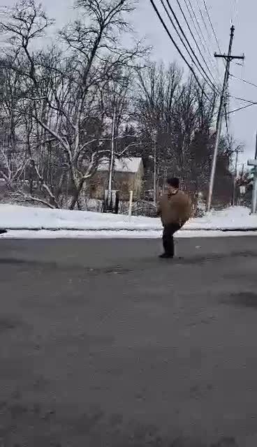 Me chasing two wild turkeys in gates today