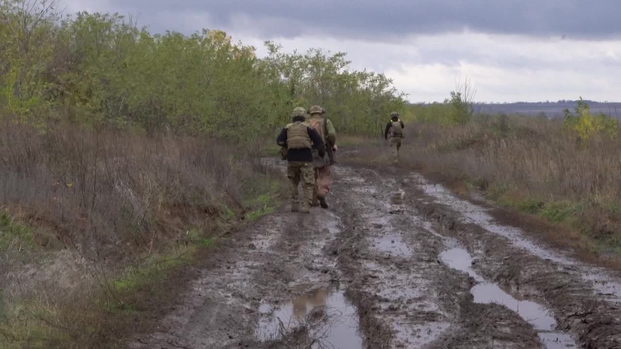 0:01 / 1:23 Ukraine's frontline trench fighters beat the chill with hot saunas