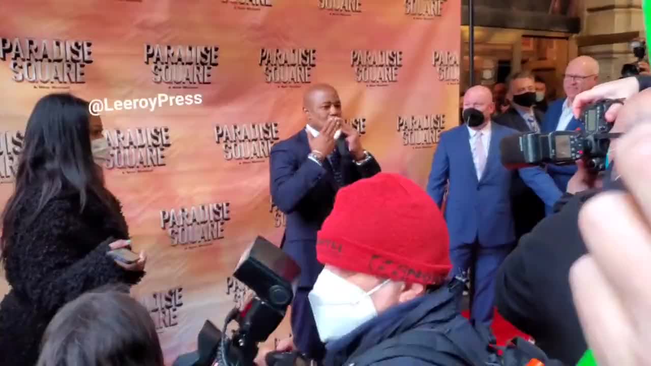 UnMasked NYC Mayor Promotes the Ongoing Grimace and Science-Free COVID Rules as Crowd Yells at Him