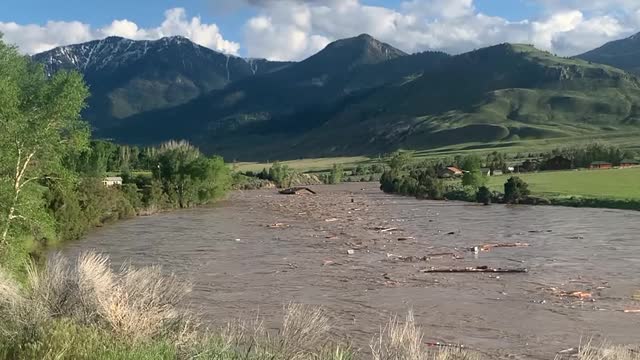 Home Falls into and Floats Down the Yellowstone River