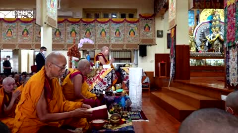 Watch the Dalai Lama lead prayers in India