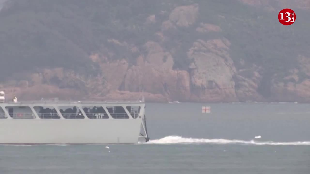 China military ship on the move amid sound of gunfire as war games start