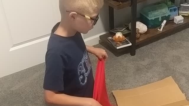 My grandson teaching me how to fold