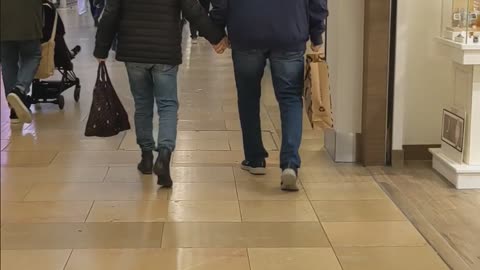 Old Couple holding Hands