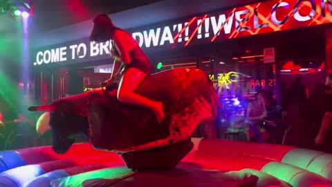 GIRL TAKE ON THE BULL! Benidorm Bull Ride. Mechanical Bull EPIC FAIL