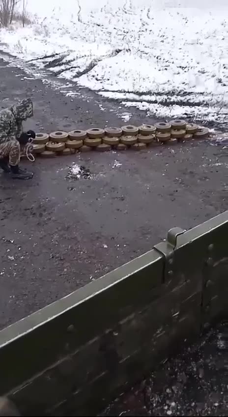 Ukrainians Blow Road With Dozens of Landmines