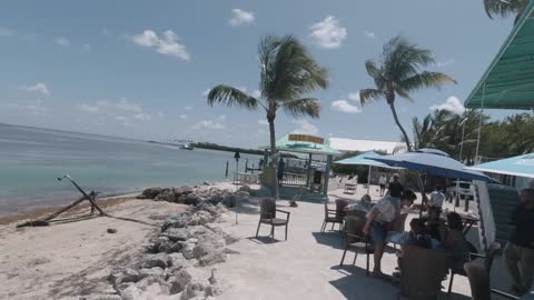 LAZY DAYS, OCEAN FRONT DINING, FLORIDA KEYS, FEED TARPON AND SHARKS