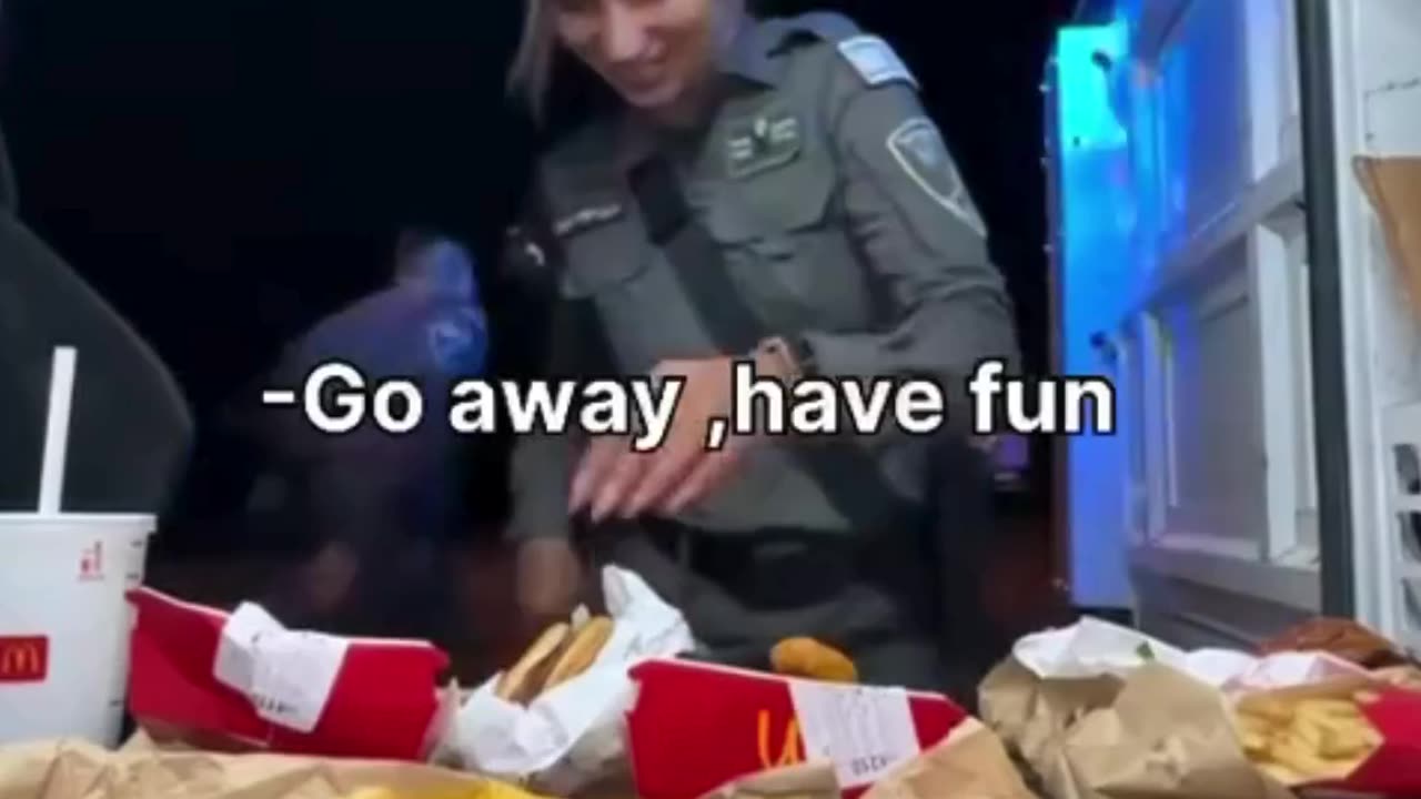 Israeli forces are seen enthusiastically devouring McDonald's meals