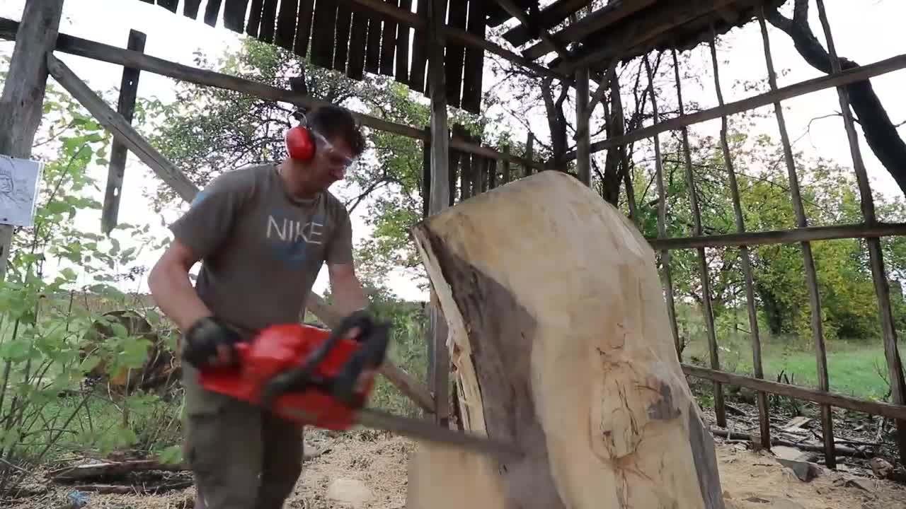 AMAZING CHAINSAW wood carving, Native American with wolves