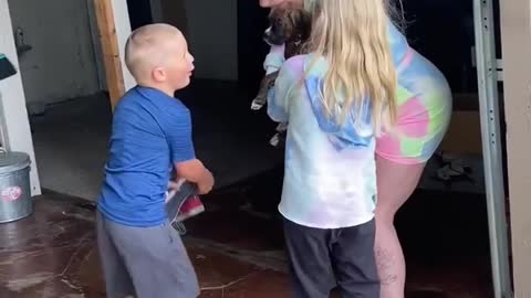 Parents Surprise Siblings With Puppy