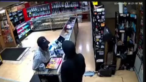 Clerk Snaps on Gunman