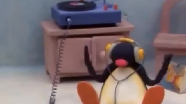 A penguin listening to a song