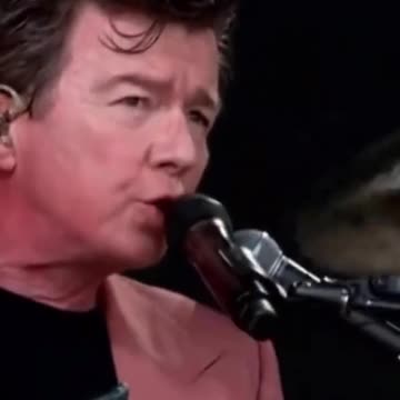 Never thought I'd live to see Rick Astley cover AC/DC & playing the drums!