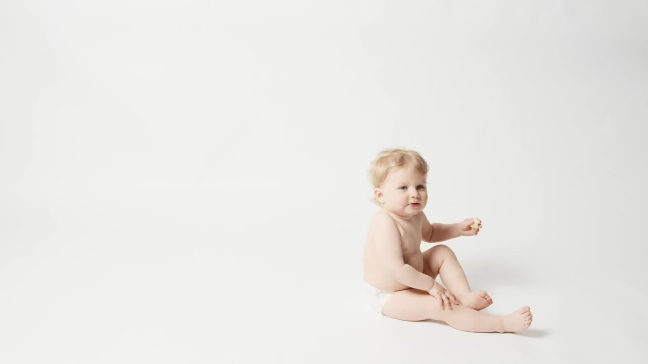 mixkit-baby-girl-in-photo-studio-8482-large