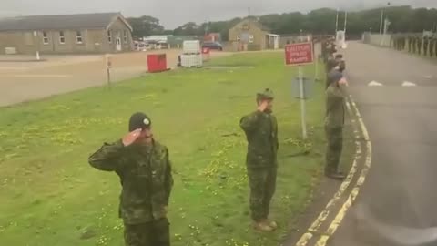 The Canadian "Army" gives a standing salute