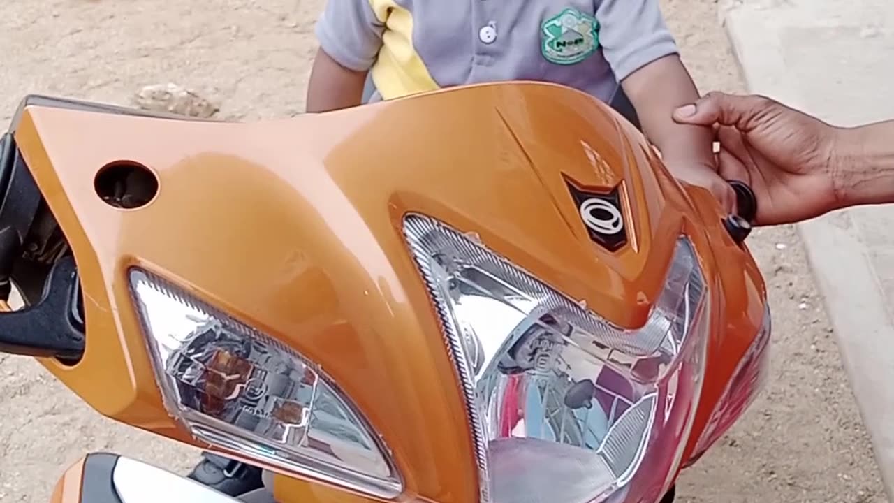 Kid on motorcycle