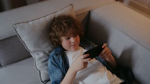 Kid is Playing game on Mobile |Enjoying