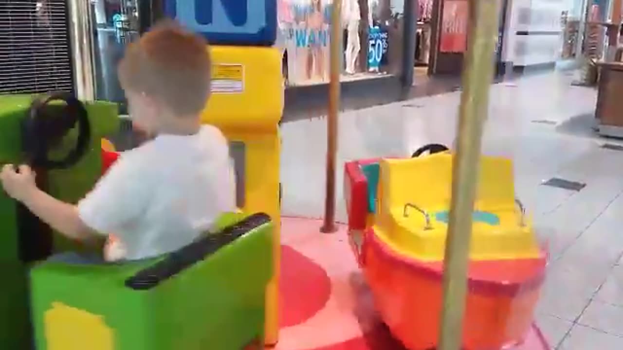 Luke Riding Trains At The Mall