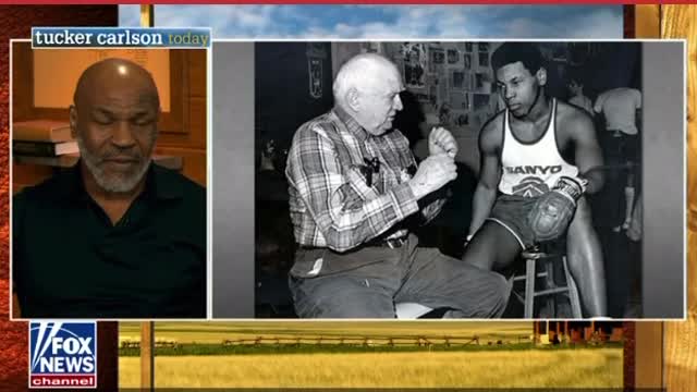 Tucker with Mike Tyson
