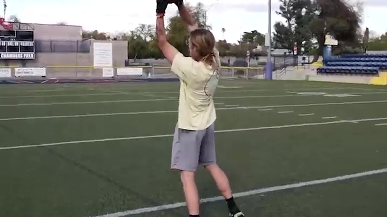 Trying to catch the fastest football ever thrown!!