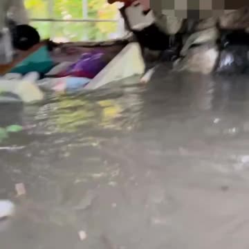 Video Shows Russians Up to Their Necks in a Flooded House