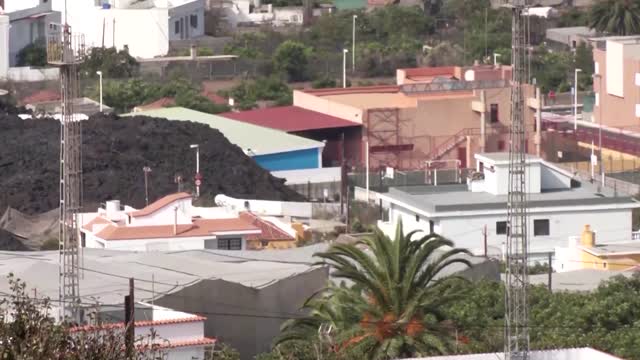 Hard lava rock cakes over Canary Island village