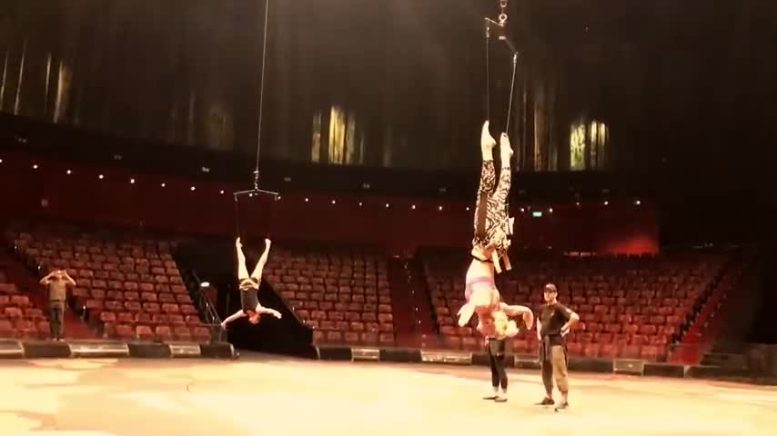 Acrobats Spin on Wires