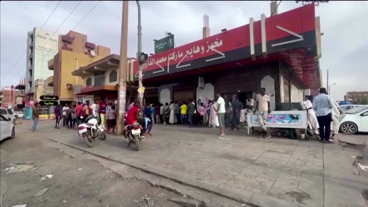 Life in Sudan means lines for food, no power