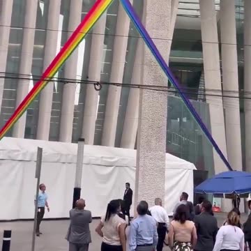 Mexico city workers make it clear what they think of the LGBTQWXYZ flag hanging from their building