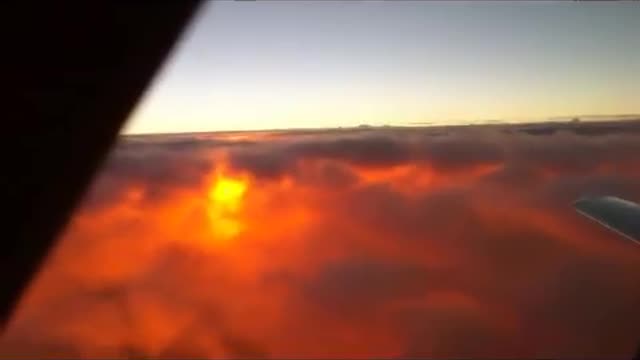 Sun Rise Under the Clouds from a Cessna